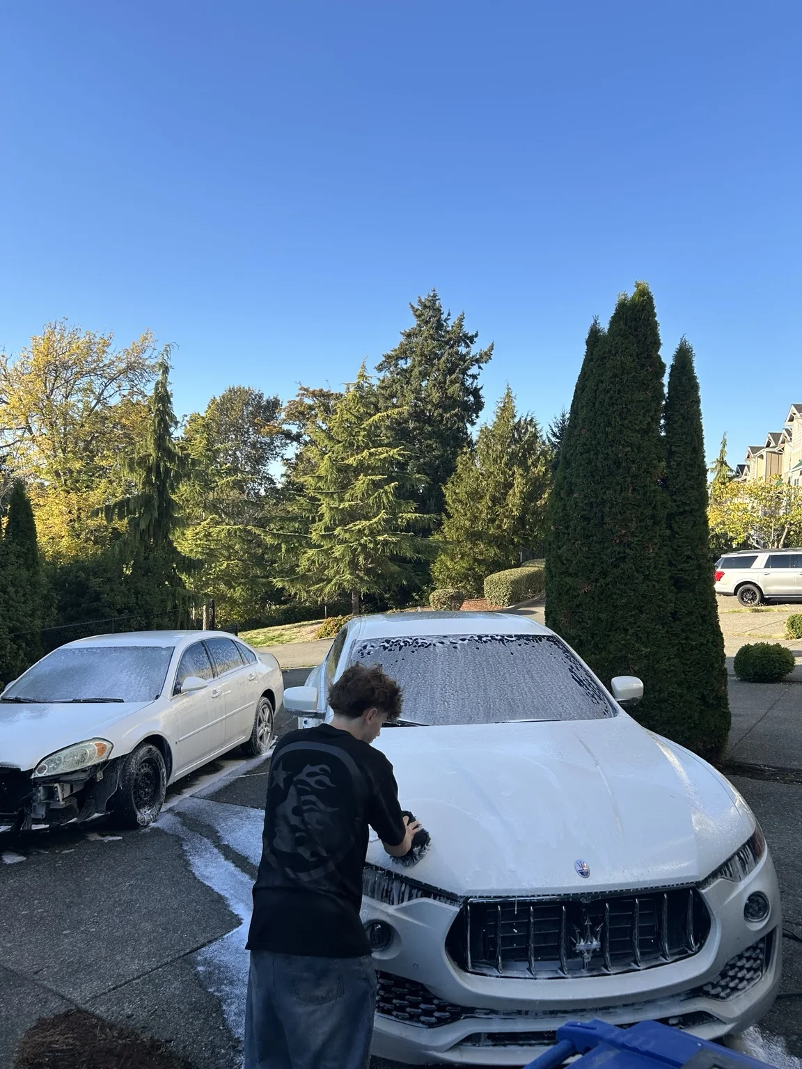 Crystal Clear Customs hand-washing a vehicle