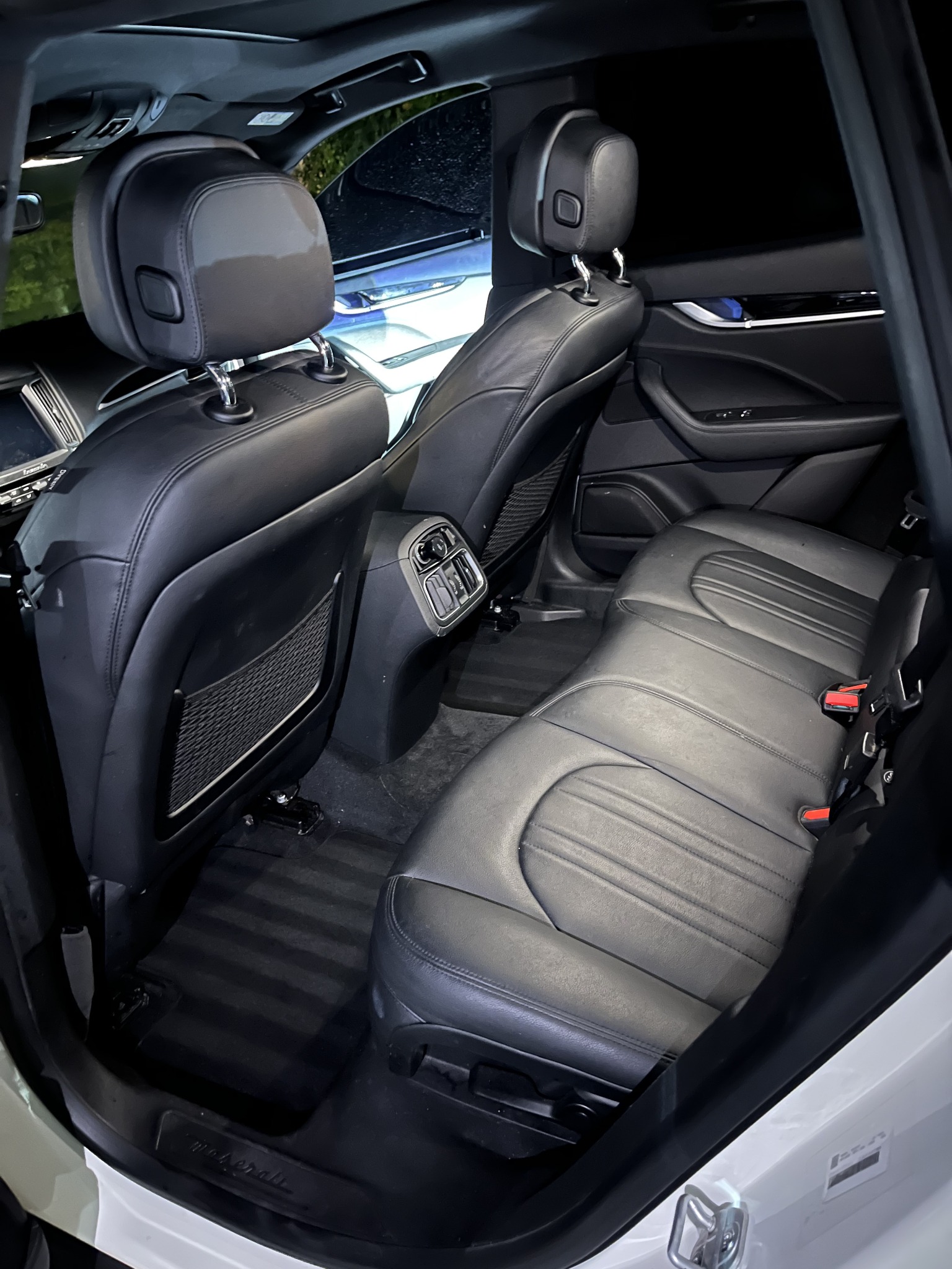 Detailed Maserati rear seats and vacuumed carpet